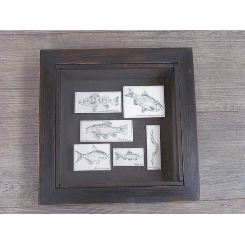 7063 - CAROLINE BAINES (XX/XXI) A framed studio pottery construction of Freshwater fish, signed and dated 1... 