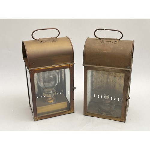 8095 - Two 20th Century ship’s lanterns, brass cased