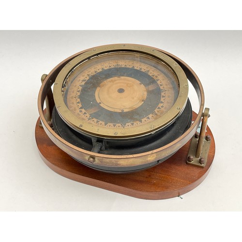 8060 - A C. Plath of Hamburg ship’s compass mounted on mahogany plinth base