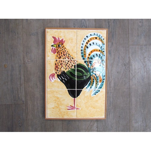 7116 - A six panel tiled wall plaque of a stylised cockerel. Overall size 48.5cmx 33cm