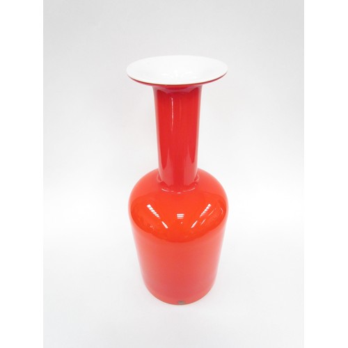 7233 - A Holmegaard large red and white glass Gul vase by Otto Brauer with original label, 44cm high