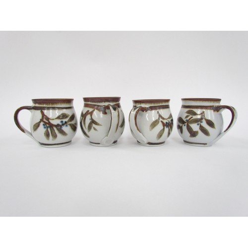 7131 - A set of four Aldermaston Pottery studio cups, painted marks to bases. 8.5cm high