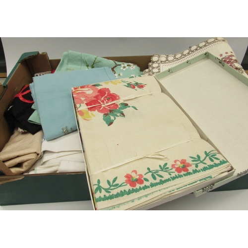 6043 - Two boxes containing mid 20th Century embroidered table linens together with a set of six printed ta... 