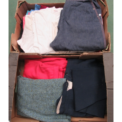 6058 - Two boxes containing mid 20th Century lady's clothing comprising wool/tweed skirts, a rust suede bat... 