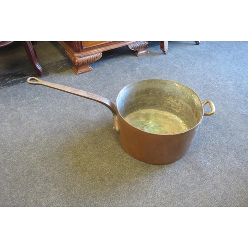 1002 - A large scale copper pan (37cm diameter) stamped G.W.R..  78cm overall length   (E) £40-60