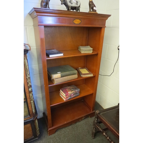 1017 - A reproduction bookcase, shell marquetry inlay, four tiers of shelving, plinth base, 151cm tall x 83... 