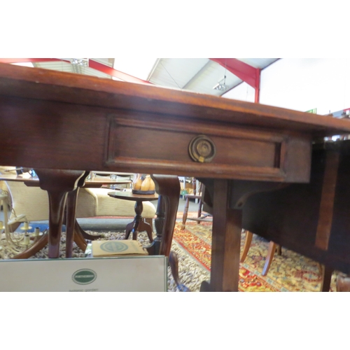 1039 - A drop-leaf hall table with twin frieze drawers on outswept legs joined by stretcher  (R) £20