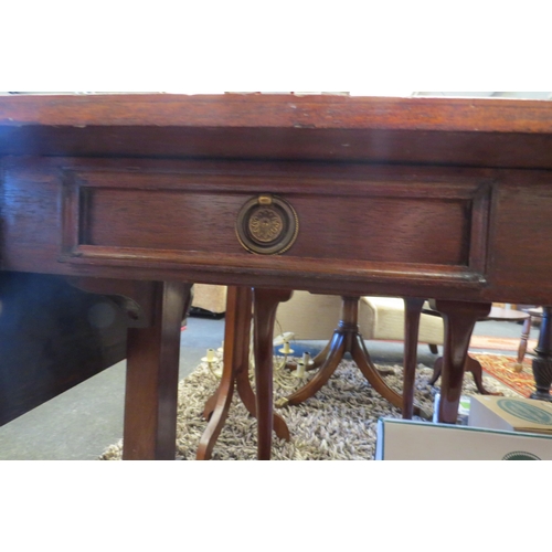 1039 - A drop-leaf hall table with twin frieze drawers on outswept legs joined by stretcher  (R) £20