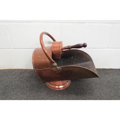 1040 - A 19th Century copper coal scuttle with scoop