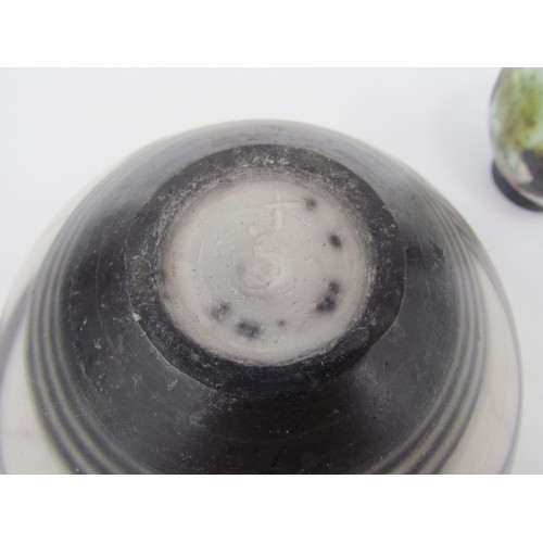 7067 - A studio pottery raku vase with oval banded decoration, initialled JS to base and a smaller raku pot... 