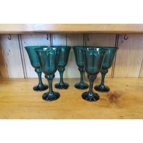 1067 - A set of six green glass wine glasses   (R) £15