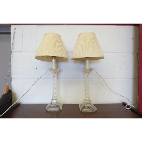 1079 - A pair of ornate glass table lamps