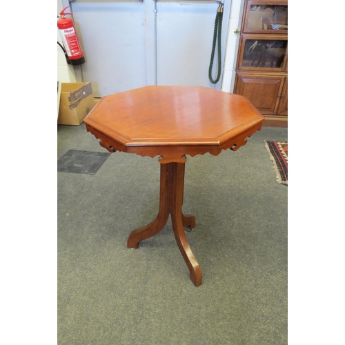 1107 - An octagonal top occasional table on tripod legs   (R) £10