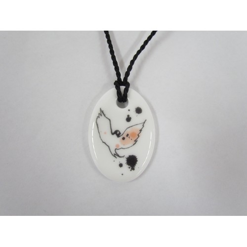 7266 - A Louisa Burfitt Swedish ceramic pendant by Rorstrand Pottery, titled Mademoiselle Oiseu verso. 4.5c... 