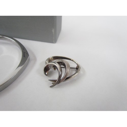 7252 - An Abbott Lyon boxed contemporary modernist bangle in original box and a West German sterling silver... 