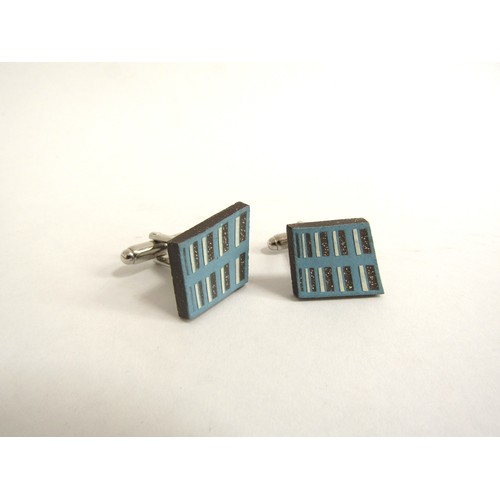 7260 - A pair of Dan Stafford ceramic cufflinks