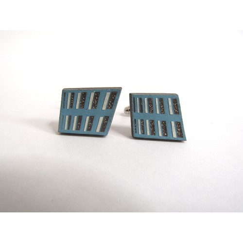 7260 - A pair of Dan Stafford ceramic cufflinks