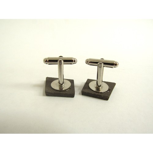 7260 - A pair of Dan Stafford ceramic cufflinks