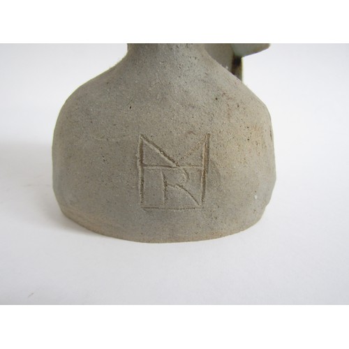 7062 - A studio pottery sculpture of a head , indistinct pottery mark to reverse, and gallery exhibition nu... 