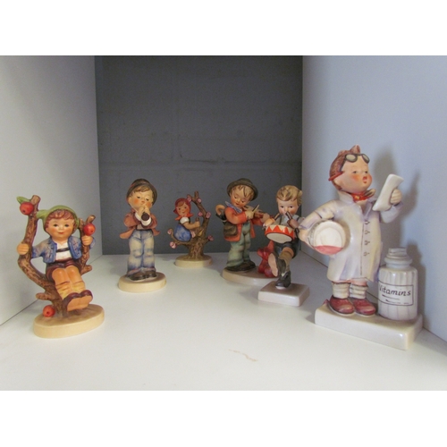 1236 - A group of six Hummel ceramic figuress including drummer etc