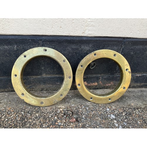 8051 - Two brass ship’s portholes, 31cm diameter      (E) £30-50    BYGONES