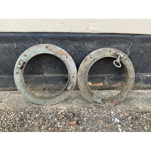 8051 - Two brass ship’s portholes, 31cm diameter      (E) £30-50    BYGONES