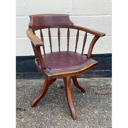 8018 - A circa 1900 walnut captain’s style swivel desk chair, studded rexine seat, spindle back