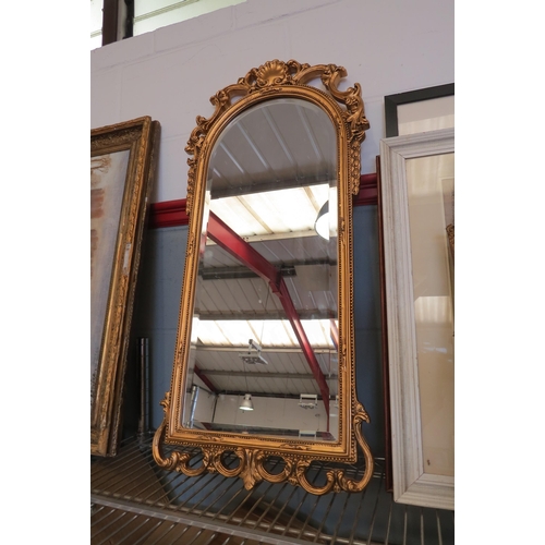 1419 - A bevelled edge gilt and gesso mirror with beaded detail, 82cm tall in total