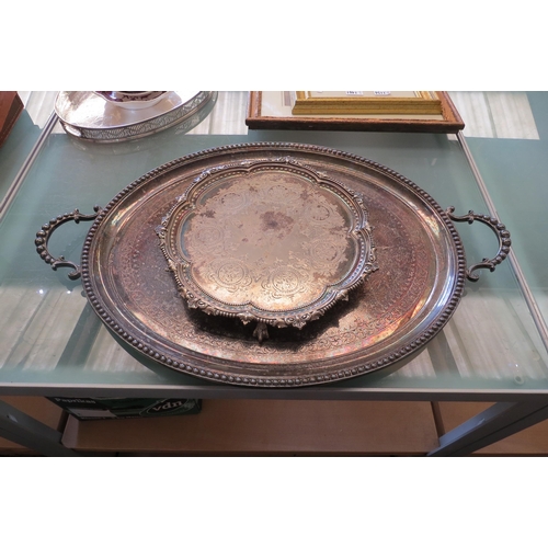 1460 - A large silver plated twin handled oval tray, beaded border, engraved presentation to centre dated 1... 