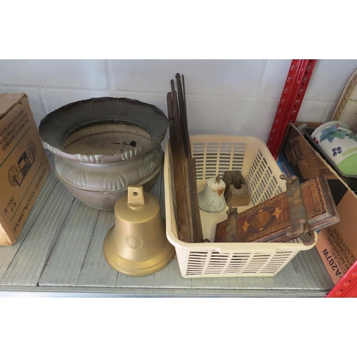 1193 - A box of metal wares including brass music stand, copper plant pot, local bell wights from Eye and a... 