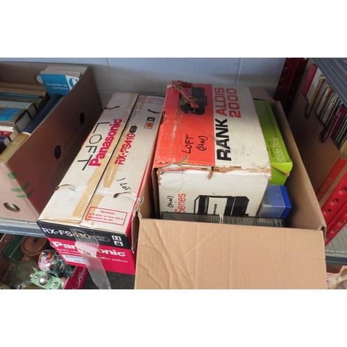 1206 - A boxed Panasonic RX-FS410 stereo radio cassette recorder and a box containing a slide projector wit... 