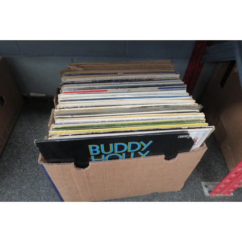 1228 - A box of assorted vinyl LP records including Buddy Holly, Gene Vincent, Roxy Music, Jazz titles etc.... 