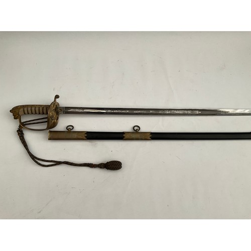 8086 - An 1827 pattern naval officer’s sword, brass hilt with King’s crown over anchor mark, ray skin grip,... 