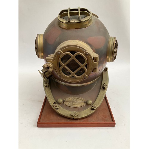 8091 - A reproduction brass and copper diving helmet, for decorative purposes