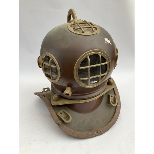 8090 - A reproduction brass and copper diving helmet, for decorative purposes