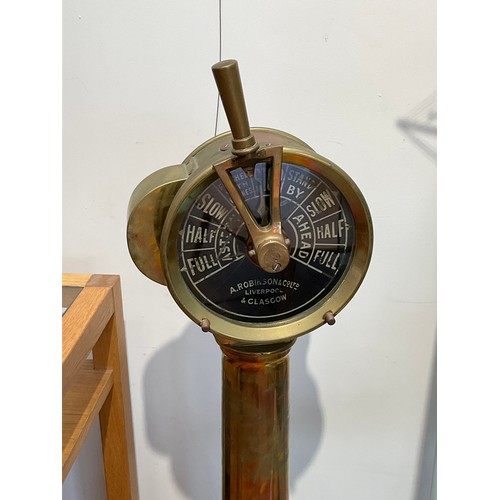 8127 - An A. Robinson & Co. Ltd. of Liverpool and Glasgow ship’s telegraph, brass cased, black dial to head... 