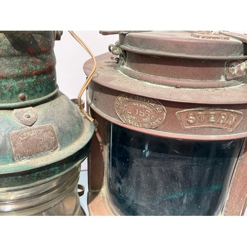 8108 - An early 20th Century ship’s Stern lamp, Smith & Barnes 2956 plaque, together with another (2)