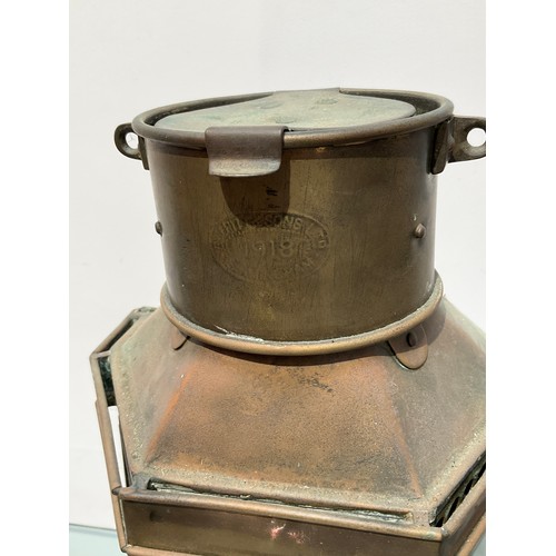 8112 - A 1918 dated brass ship’s cabin lantern, 40.5cm high