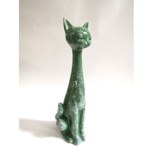 7012 - A large Italian pottery figure of a cat with a 'marbled' green and white painted glaze. 53cm high