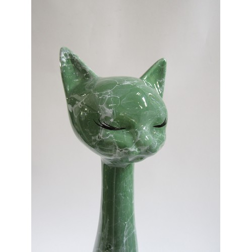 7012 - A large Italian pottery figure of a cat with a 'marbled' green and white painted glaze. 53cm high