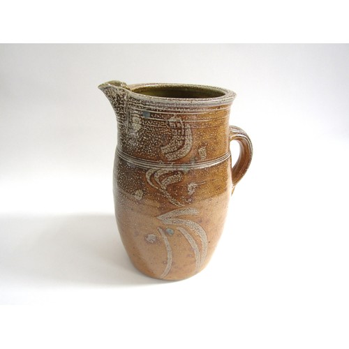 7077 - MICHAEL CASSON (1925-2003): A large saltglaze jug with brushwork decoration. Impressed potters mark ... 