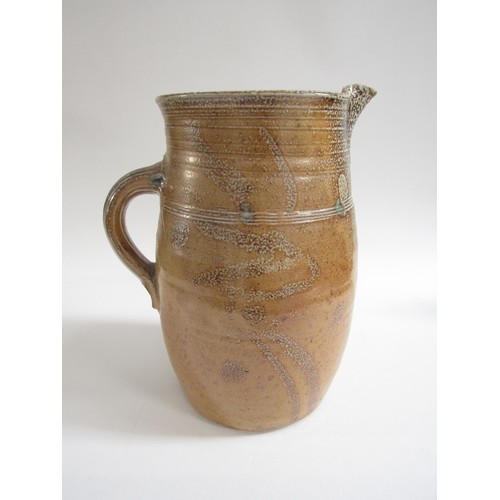 7077 - MICHAEL CASSON (1925-2003): A large saltglaze jug with brushwork decoration. Impressed potters mark ... 