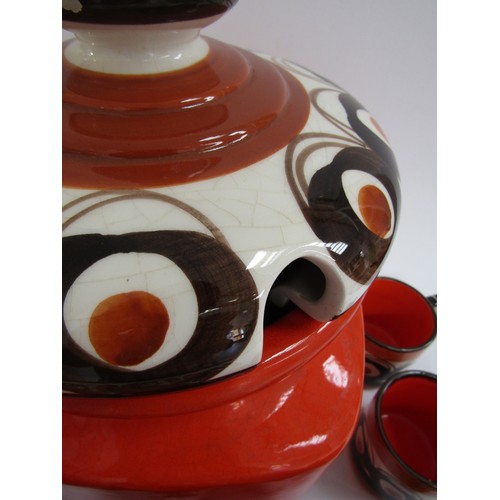 7046 - A Schaemberg Pottery large lidded canister in orange and brown glazes, 36cm high, together with 12 m... 