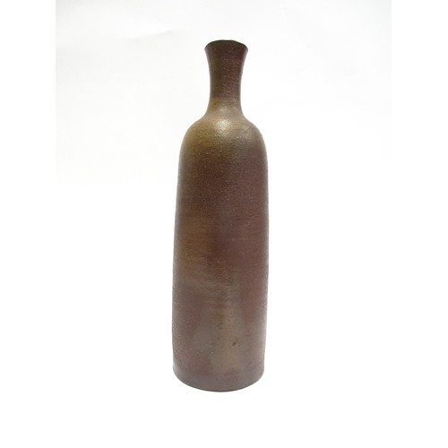 7060 - JOANNA CONSTANTINIDIS (1927-2000) A studio pottery early cylindrical vase, brown glazed.  Impressed ... 