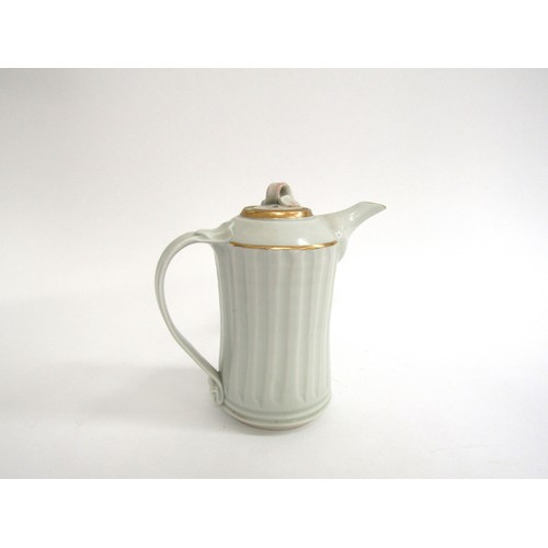 7091 - BRIDGET DRAKEFORD (b.1946) A studio porcelain small coffee pot in celedon glaze and gilt rim - Signe... 