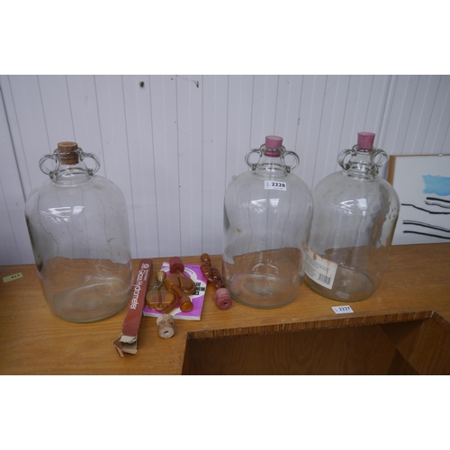 3525 - Three demijohns with accessories