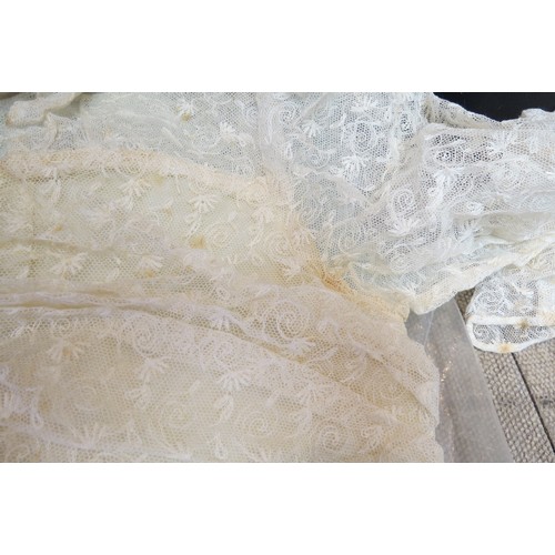 6026 - A 1930's bridal veil with a waxed headdress together with two 1930's wedding dresses