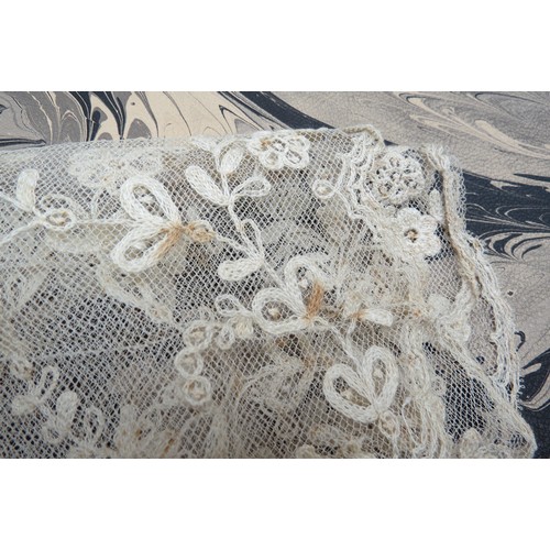 6023 - A selection of Victorian and later under-garments, a silver lame shawl, lace shawl and a black silk ... 