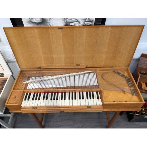 4024 - A 1970's clavichord, cased in oak, by Brian Joseph Summers, an aircraft engineer, built in 1974, wit... 