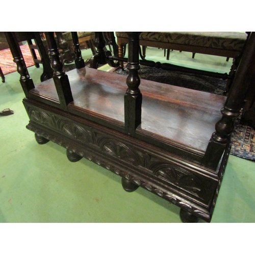 4033 - A 17th Century revival carved oak two tier dresser base of small proportions the three frieze drawer... 